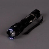 Sabre Tactical Stun Gun-led Flashlight Delivers 1.139 Microcoulombs-80 Lumens